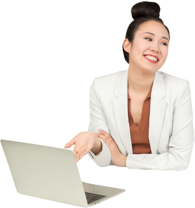 Female Office Worker Laughing at Her Laptop